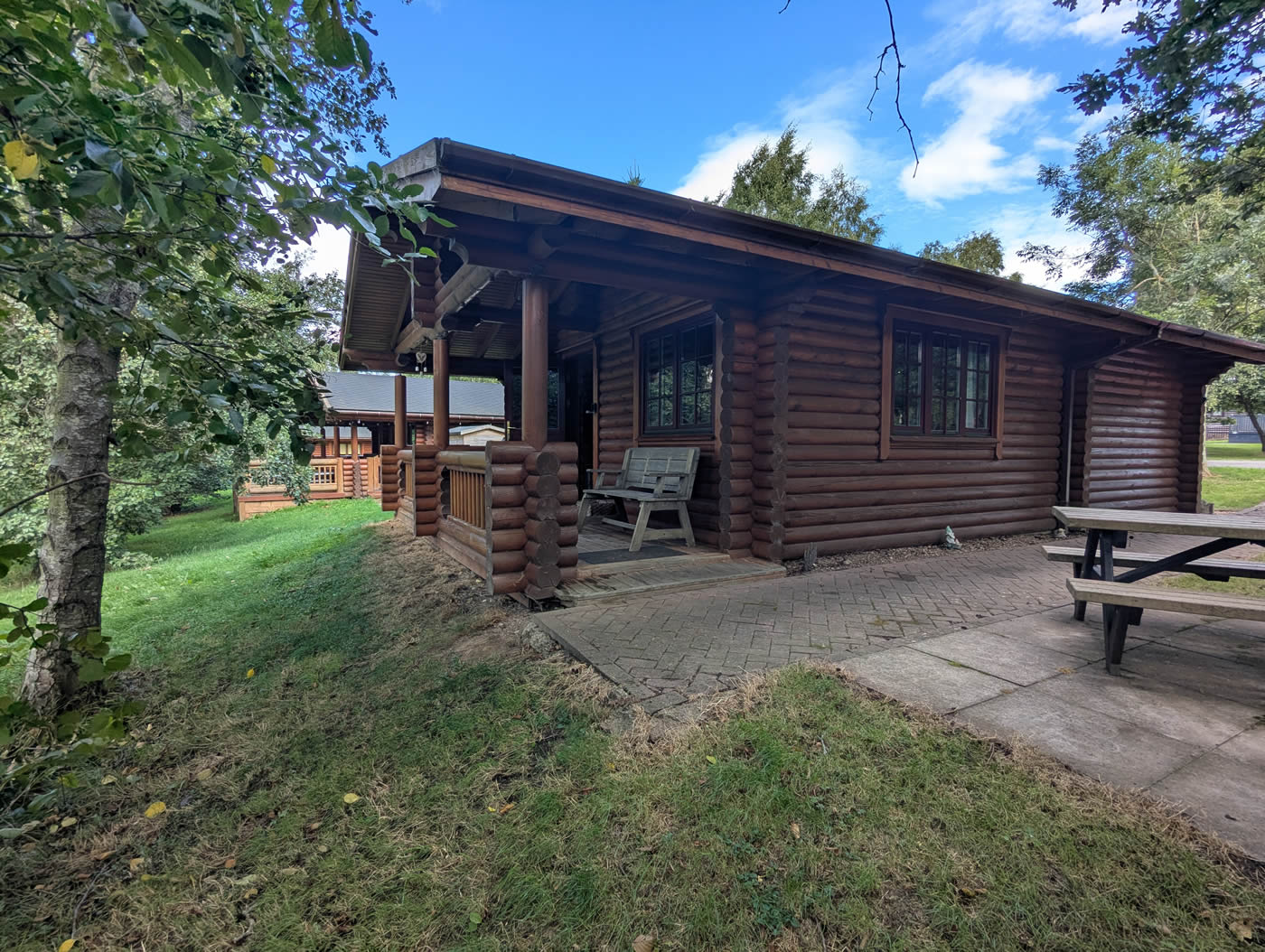 Log Cabin Lodge on Felmoor Park - Exterior Side View